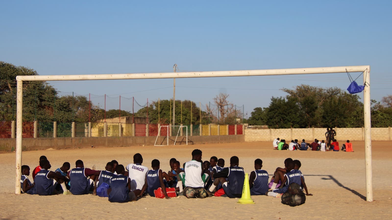 Young players celebrating during a football session