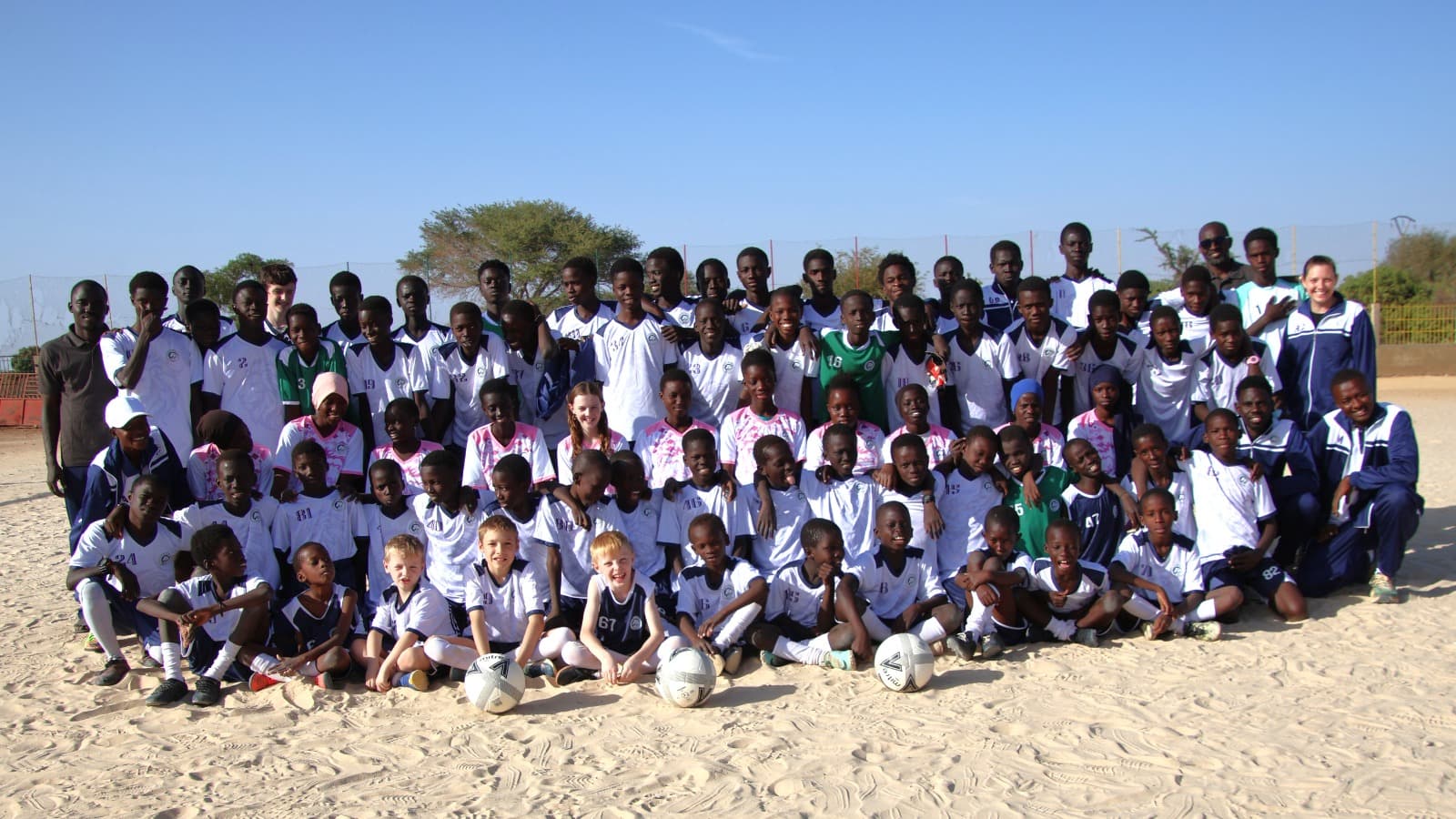 Yakaar FC players and coaches together in Senegal
